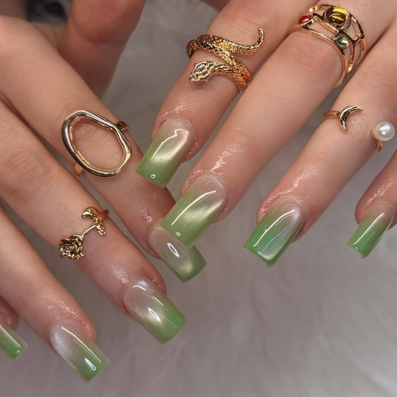 Green aura chrome nails by Nini Nail Bar