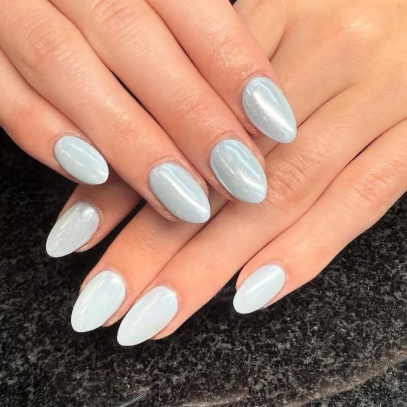 Soft pale blue almond nails by Nini Nail Bar