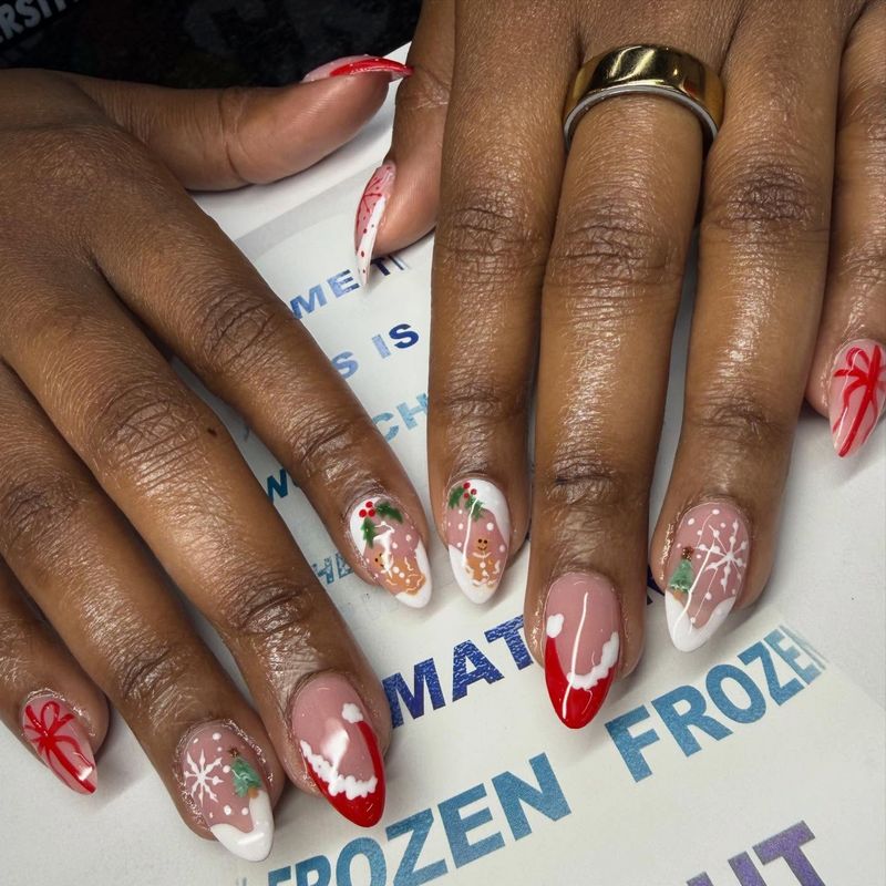 Nude nails with red floral accents by Nini Nail Bar