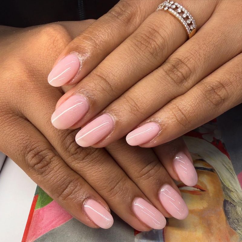 Soft pink almond manicure by Nini Nail Bar