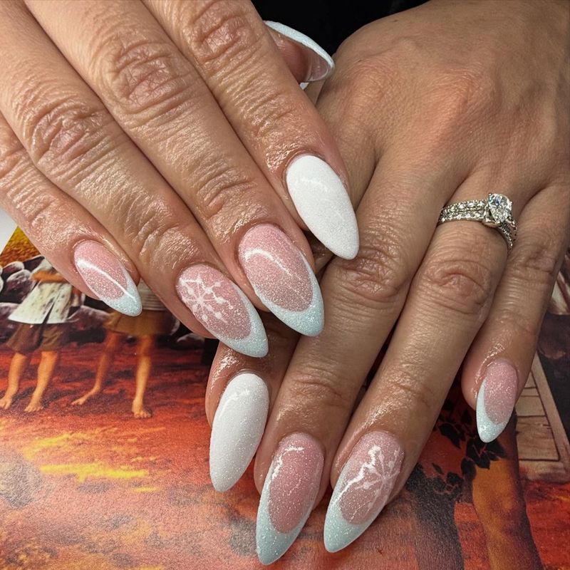 Nude almond nails with white and mint French tips by Nini Nail Bar